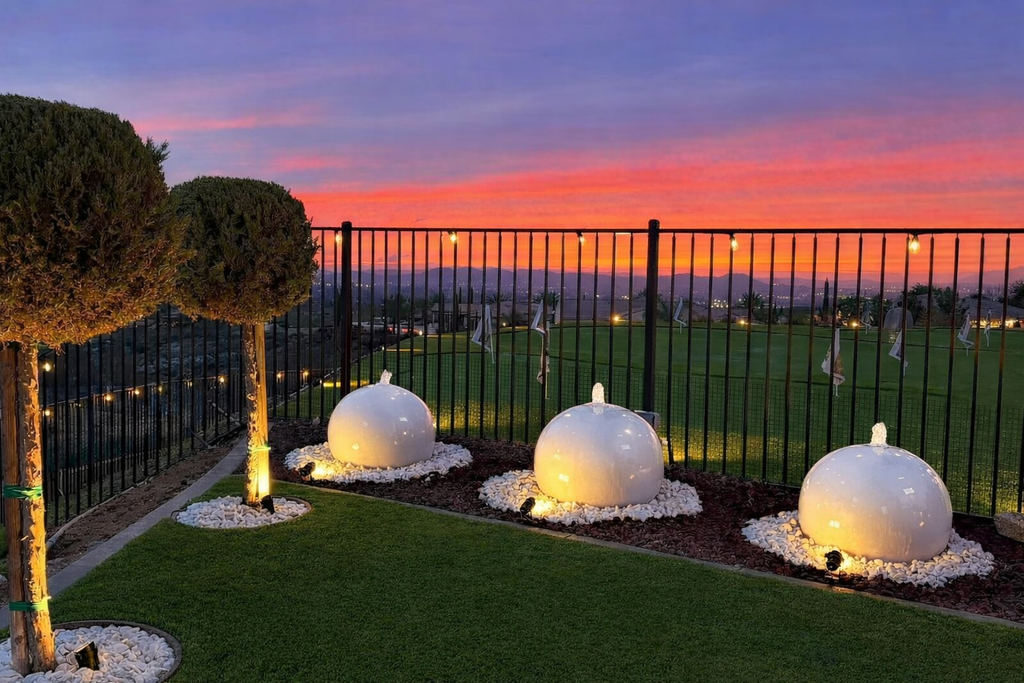 A set of (2)...24'' concrete spheres