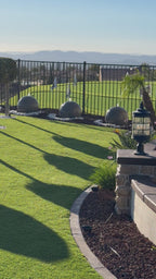 A set of (2)...24'' concrete spheres